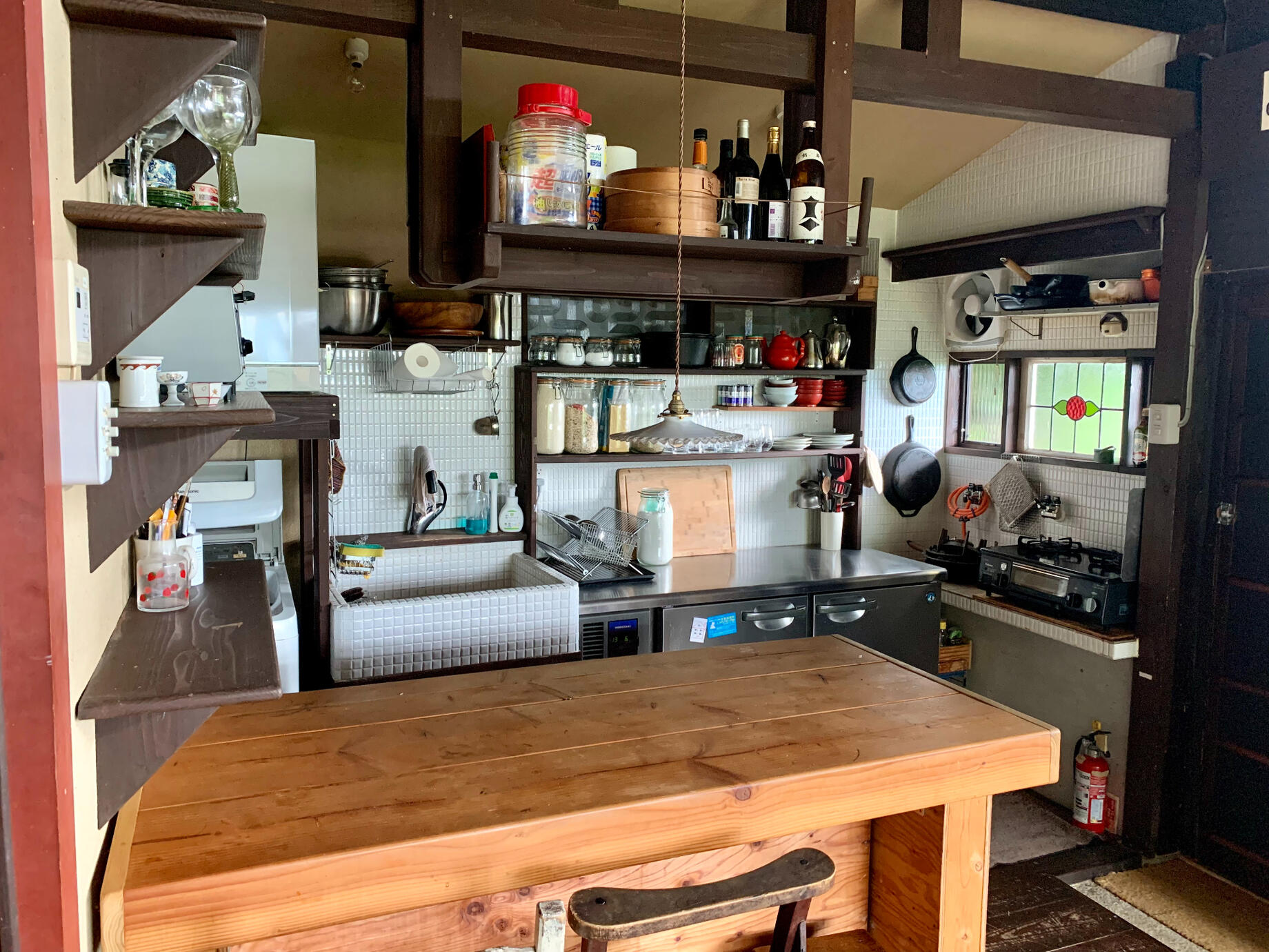 The chef&#39;s kitchen features two burners and an under-the-counter Hoshizaki.